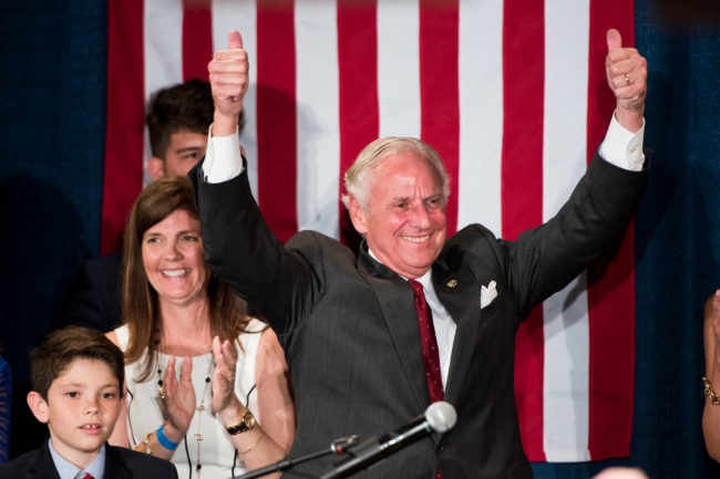 South Carolina Governor Henry McMaster gives the crowd two thumbs up during a gubernatorial primary runoff election watch party at Spirit Communications Park on June 26, 2018 in Columbia, South Carolina