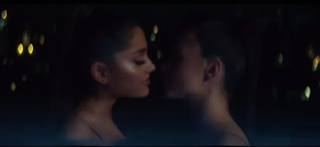 Ariana Grande kisses Ariel Yasmine in the "Break Up With Your Girlfriend, I'm Bored" video