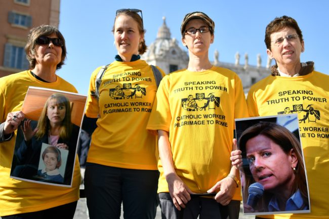 Members of Ending Clergy Abuse (ECA), a global organization of prominent survivors and activists who are in Rome for this weeks papal summit, display photos of Barbara Blaine, the late founder and president of Survivors Network of those Abused by Priests (SNAP), during an action on February 21, 2019 in Rome.