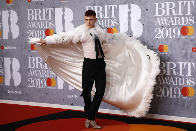 Olly Alexander poses on the red carpet on arrival for the BRIT Awards 2019 in London on February 20, 2019.