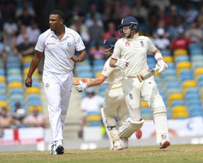 Joe Root (R) of England get runs off Shannon Gabriel (L) of West Indies during day 4 of the 1st Test between West Indies and England at Kensington Oval, Bridgetown, Barbados, on January 26, 2019