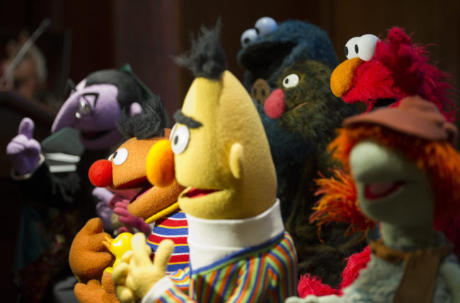 Bert and Ernie, who have long been rumoured to be gay, stand with 20 newly donated Jim Henson puppets and props on the anniversary of his birthday during an event at the Smithsonian National American History Museum in Washington, DC, on September 24, 2013