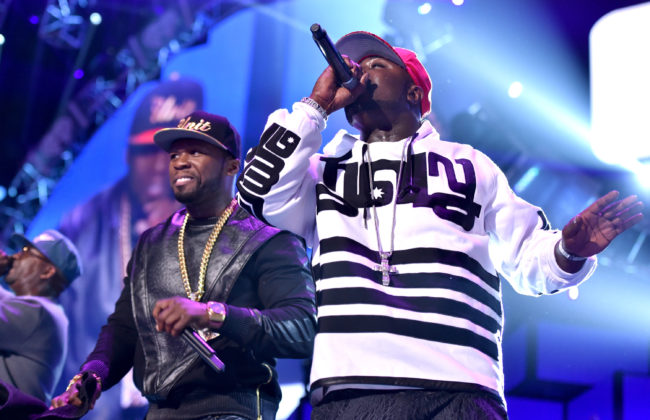 Recording artists Curtis '50 Cent' Jackson (L) and Young Buck of the music group G-Unit perform onstage during the 2014 iHeartRadio Music Festival at the MGM Grand Garden Arena on September 20, 2014 in Las Vegas, Nevada.