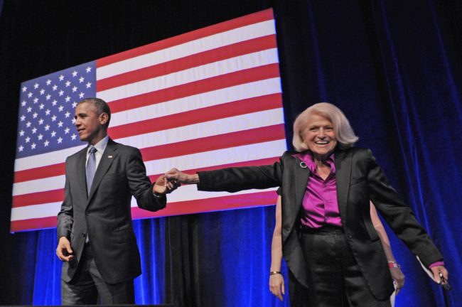 US President Barack Obama holds hands with Edie Windsor after she introduced him during the Democratic National Committee LGBT Gala at Gotham Hall on June 17, 2014 in New York.
