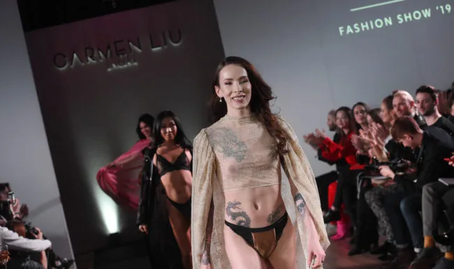 Transgender lingerie designer Carmen Liu walks the runway during the launch of the World's First Transgender Lingerie Brand 'GI Collection' at Glaziers Hall on February 28, 2019 in London, England.