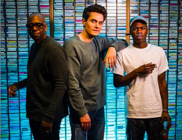 Dave Chappelle (L) called Daniel Caesar (R) "very gay" during an appearance on John Mayer's (M) Instagram Live show. 