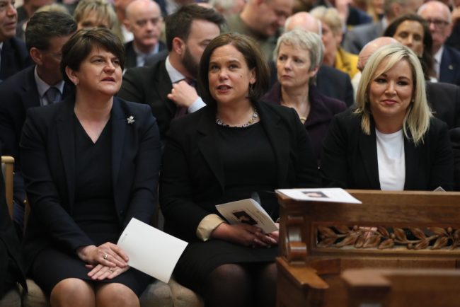 (L-R) Democratic Unionist Party (DUP) leader Arlene Foster, Irish Republican Sinn Fein party leader Mary Lou McDonald and Sinn Fein Northern Leader Michelle O'Neill attend the funeral service of journalist Lyra McKee, who was killed by a dissident republican paramilitary in Northern Ireland on April 18, at St Anne's Cathedral in Belfast on April 24, 2019. 