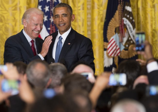Joe Biden LGBT rights record: US President Barack Obama and US Vice President Joe Biden attend a reception in honor of LGBT Pride Month in the East Room of the White House in Washington, DC, June 24, 2015. 