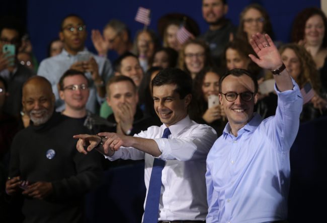 South Bend Mayor Pete Buttigieg acknowledges attendees with his husband Chasten Buttigieg after announcing his presidential candidacy for 2020 during an event on Sunday, April 14, 2019 in South Bend, Indiana.