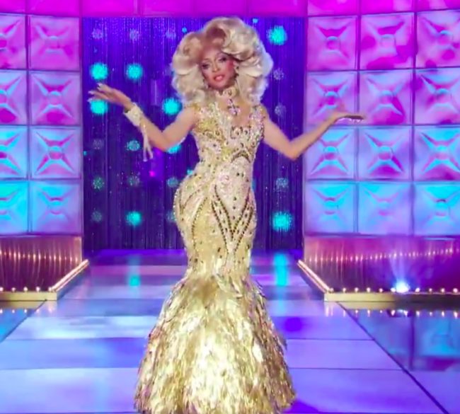 RuPaul's Drag Race queen A'keria glitters all over the stage. 