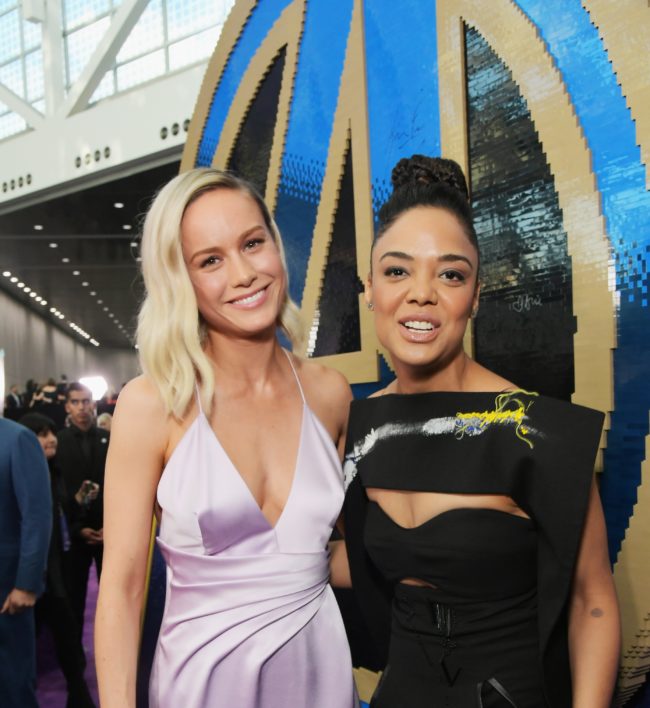 Brie Larson and Tessa Thompson attend the Los Angeles World Premiere of Marvel Studios' Avengers: Endgame at the Los Angeles Convention Center on April 23, 2019 in Los Angeles, California. 