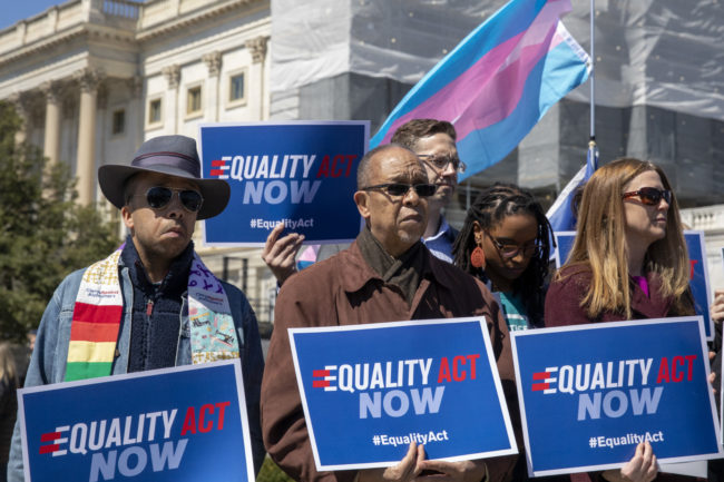 Protesters stand in support of a introduction of the Equality Act, a comprehensive LGBTQ non-discrimination bill at the US Capitol on April 01, 2019 in Washington, DC. 