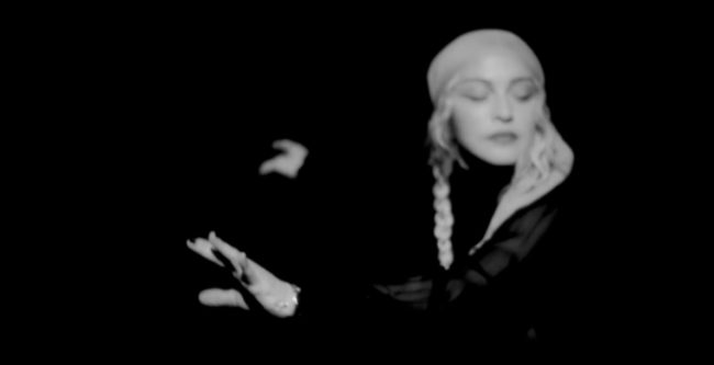 Madonna dances to the track "I Rise"