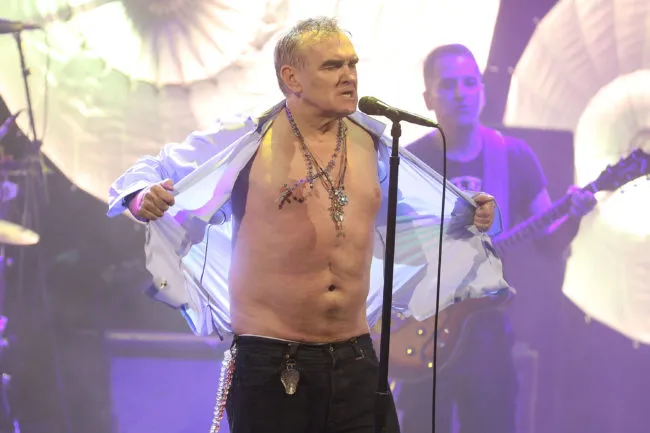 Morrissey rips off his shirt during the encore as he performs during his Broadway debut at Lunt-Fontanne Theatre on May 2, 2019 in New York City.  