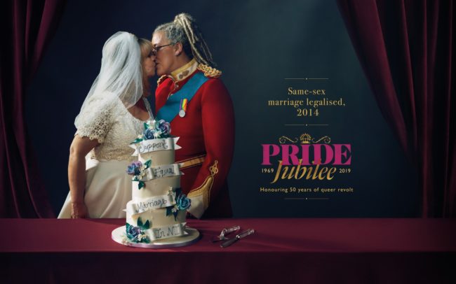 A Pride Jubilee billboard of a lesbian couple marrying